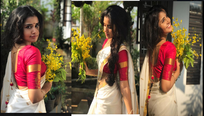 സെറ്റ് സാരിക്കൊപ്പം ചുവന്ന ബ്ലൗസ്.! കൈയില്‍ കൊന്നപൂവ്; വിഷു ആശംസകളുമായി നടി അനുപമയുടെ ഫോട്ടോഷൂട്ട്